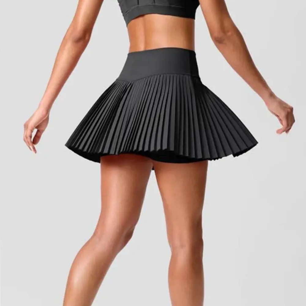 Black Pleated Women's athletic skort. Flattering and super cute. M